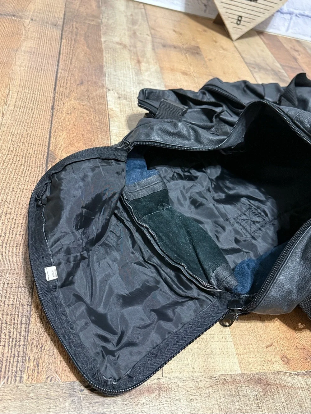 Heavy Duty Black Leather Motorcycle Backpack  Pre owned good condition.. there i